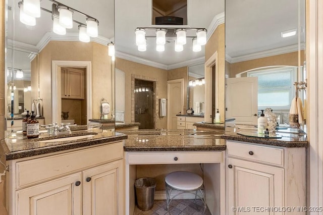 bathroom featuring crown molding, tile patterned flooring, a shower stall, and vanity