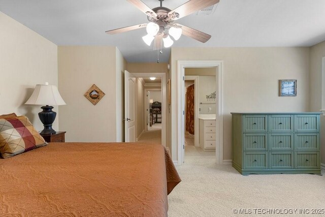 bedroom with light colored carpet, visible vents, and a ceiling fan