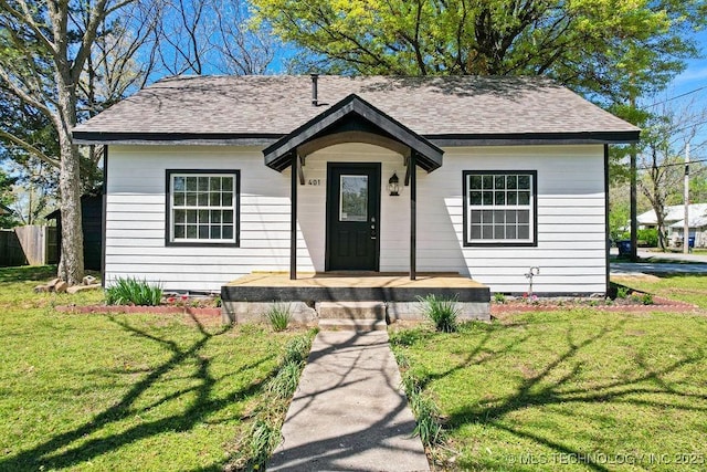 401 S Brewer St, Vinita, OK 74301 - bungalow with roof with shingles and a front yard