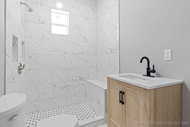 401 S Brewer St, Vinita, OK 74301 - full bath featuring tiled shower, vanity, and toilet