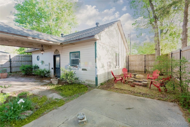 exterior space with a fenced backyard and a patio