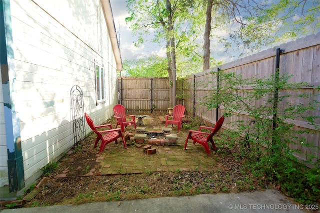 view of yard with a fenced backyard and a patio area