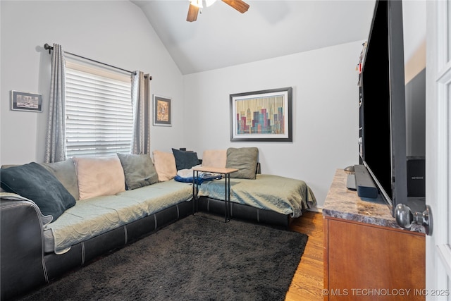 3235 Boardwalk Ct, Bartlesville, OK 74006 - living area with lofted ceiling, wood finished floors, and ceiling fan