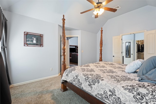 3235 Boardwalk Ct, Bartlesville, OK 74006 - bedroom featuring a walk in closet, vaulted ceiling, visible vents, and carpet flooring