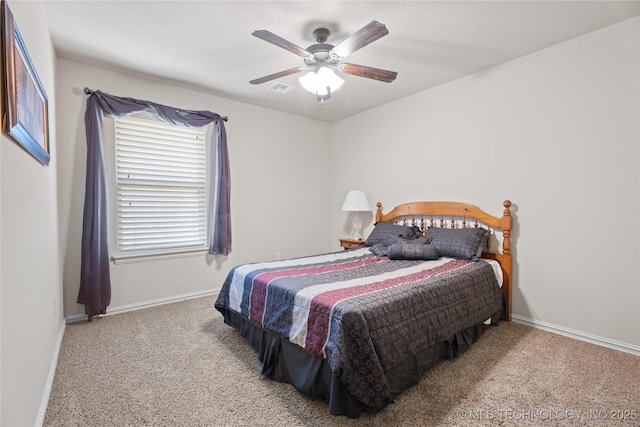 3235 Boardwalk Ct, Bartlesville, OK 74006 - bedroom with baseboards, carpet flooring, and visible vents