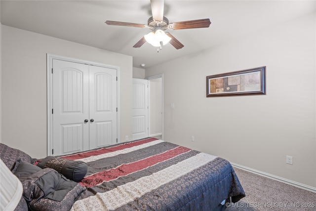 3235 Boardwalk Ct, Bartlesville, OK 74006 - bedroom featuring baseboards, a ceiling fan, carpet flooring, and a closet