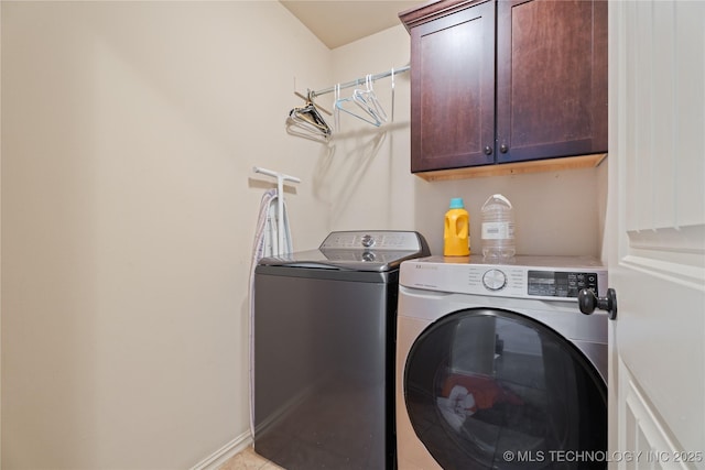 3235 Boardwalk Ct, Bartlesville, OK 74006 - laundry room with cabinet space, baseboards, and washer and dryer