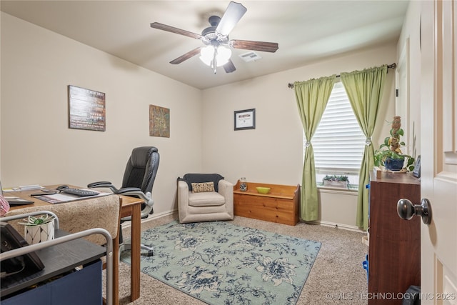 3235 Boardwalk Ct, Bartlesville, OK 74006 - carpeted office space featuring visible vents, baseboards, and ceiling fan