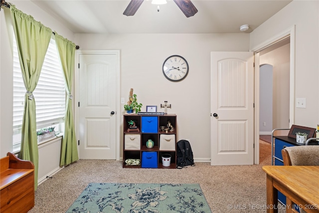3235 Boardwalk Ct, Bartlesville, OK 74006 - carpeted bedroom with baseboards and ceiling fan