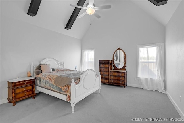 12754 S Irvington Ave, Tulsa, OK 74137 - bedroom with baseboards, carpet flooring, high vaulted ceiling, and multiple windows