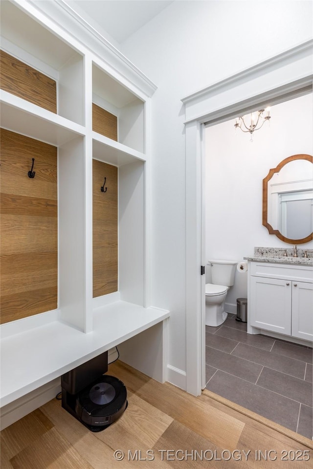 mudroom with a sink