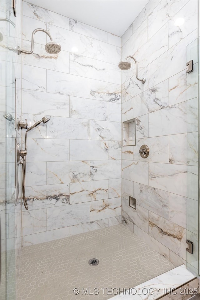 full bathroom with a shower stall
