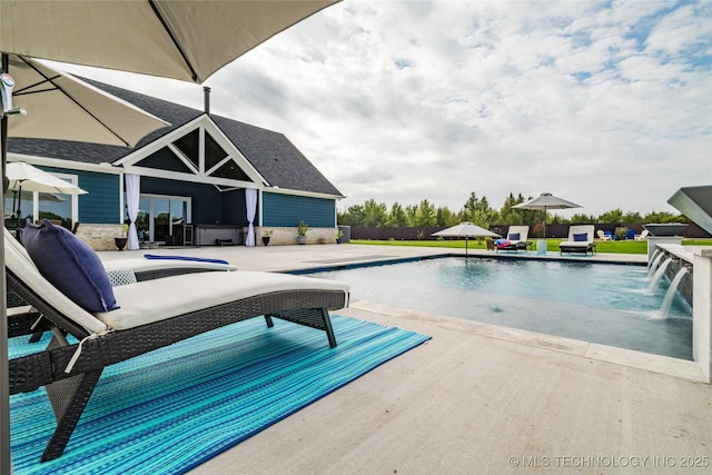 pool with a patio area