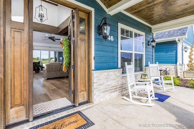 entrance to property featuring a porch