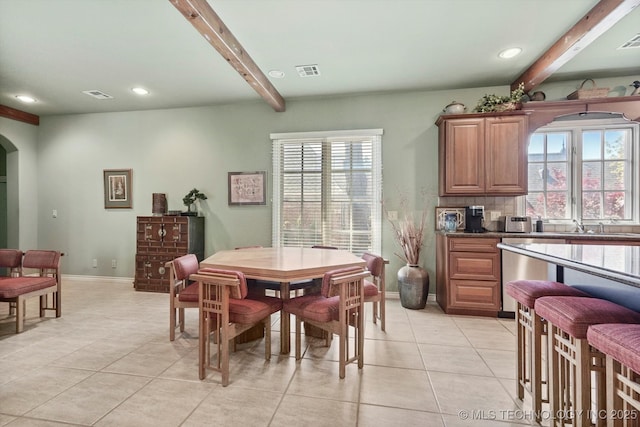 10135 S 78th E Ave, Tulsa, OK 74133 - dining area featuring beamed ceiling, a wealth of natural light, visible vents, and arched walkways