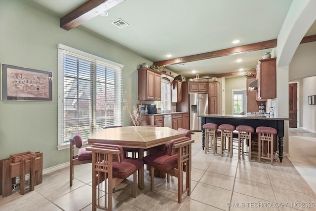 10135 S 78th E Ave, Tulsa, OK 74133 - dining room featuring light tile patterned flooring, baseboards, visible vents, recessed lighting, and beamed ceiling