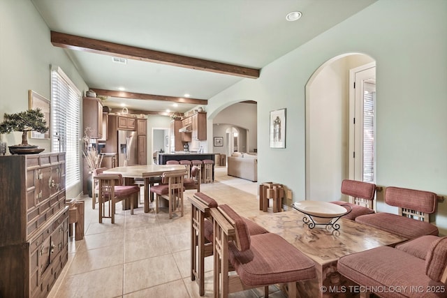10135 S 78th E Ave, Tulsa, OK 74133 - dining room featuring recessed lighting, visible vents, light tile patterned floors, arched walkways, and beamed ceiling