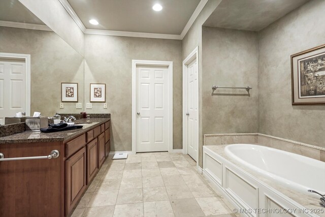10135 S 78th E Ave, Tulsa, OK 74133 - bathroom with baseboards, a bath, crown molding, and vanity