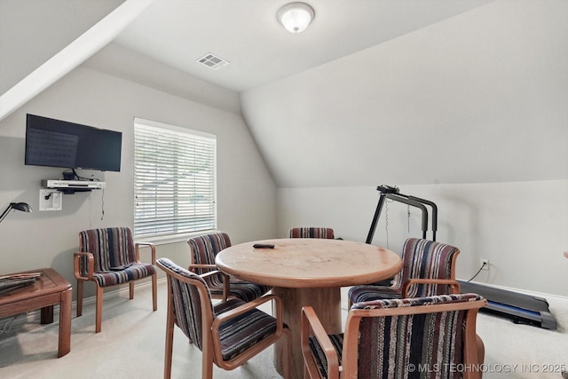 10135 S 78th E Ave, Tulsa, OK 74133 - dining room featuring baseboards, vaulted ceiling, visible vents, and light colored carpet