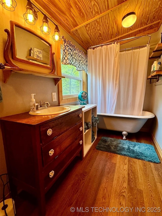139 N Bk 1800 Rd, Stigler, OK 74462 - bathroom featuring wooden ceiling, vanity, wood finished floors, and shower / bath combination with curtain