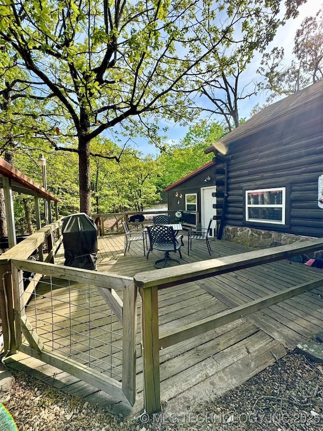 139 N Bk 1800 Rd, Stigler, OK 74462 - deck featuring grilling area and outdoor dining area