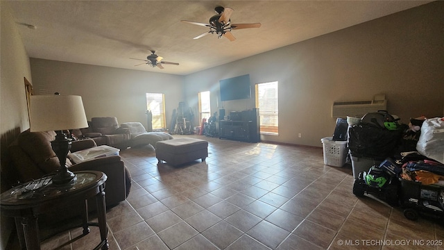 506 S Delaware Ave, Okmulgee, OK 74447 - tiled living area featuring a ceiling fan