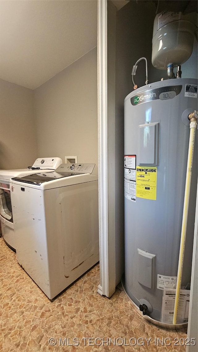 506 S Delaware Ave, Okmulgee, OK 74447 - laundry room with water heater, laundry area, and washer / dryer