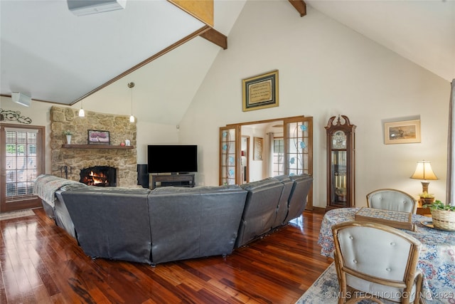 10421 S Richmond Pl, Tulsa, OK 74137 - living area with french doors, beam ceiling, a stone fireplace, high vaulted ceiling, and dark wood-type flooring