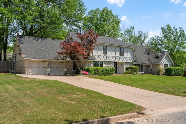 10421 S Richmond Pl, Tulsa, OK 74137 - view of front of house with a front lawn, driveway, stone siding, and a garage