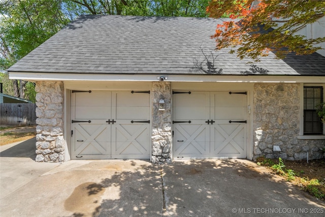 10421 S Richmond Pl, Tulsa, OK 74137 - garage featuring concrete driveway and fence