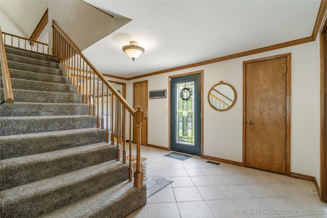 10421 S Richmond Pl, Tulsa, OK 74137 - foyer entrance with stairway, baseboards, ornamental molding, and visible vents