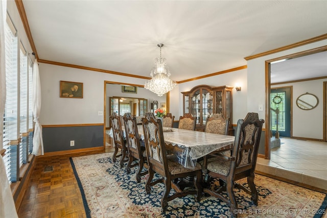 10421 S Richmond Pl, Tulsa, OK 74137 - dining space featuring ornamental molding, baseboards, and a notable chandelier