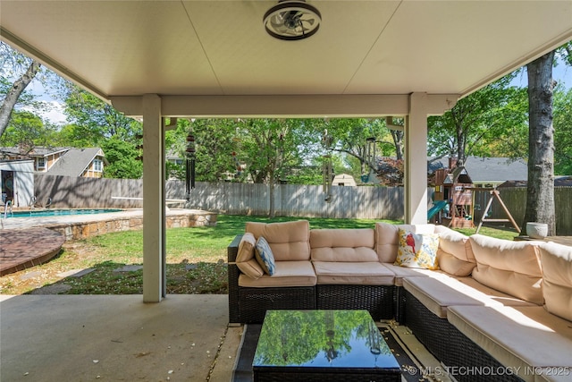 10421 S Richmond Pl, Tulsa, OK 74137 - view of patio with a fenced backyard, a playground, and an outdoor hangout area