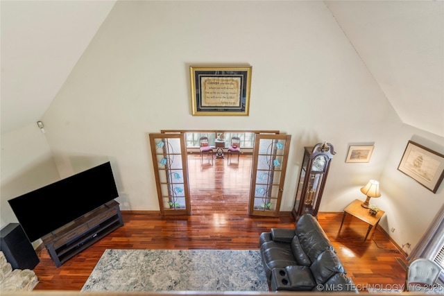 10421 S Richmond Pl, Tulsa, OK 74137 - living area featuring wood finished floors and high vaulted ceiling
