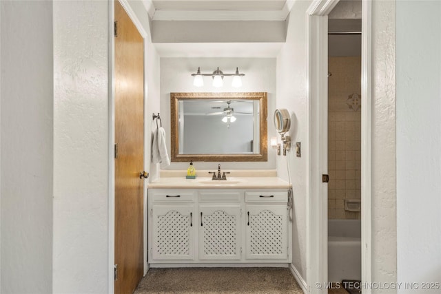 10421 S Richmond Pl, Tulsa, OK 74137 - bathroom with a textured wall, shower / bathtub combination, vanity, crown molding, and ceiling fan