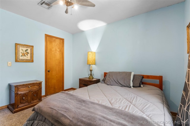 10421 S Richmond Pl, Tulsa, OK 74137 - carpeted bedroom with visible vents, a ceiling fan, and baseboards