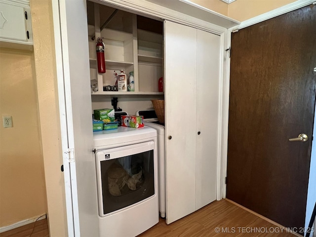 1380 N Lakeview Ave, Mannford, OK 74044 - washroom with separate washer and dryer, laundry area, and light wood finished floors