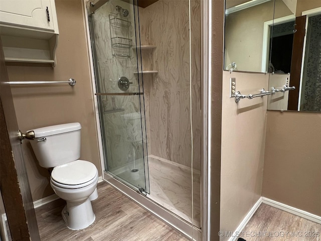 1380 N Lakeview Ave, Mannford, OK 74044 - bathroom with baseboards, a shower stall, and wood finished floors