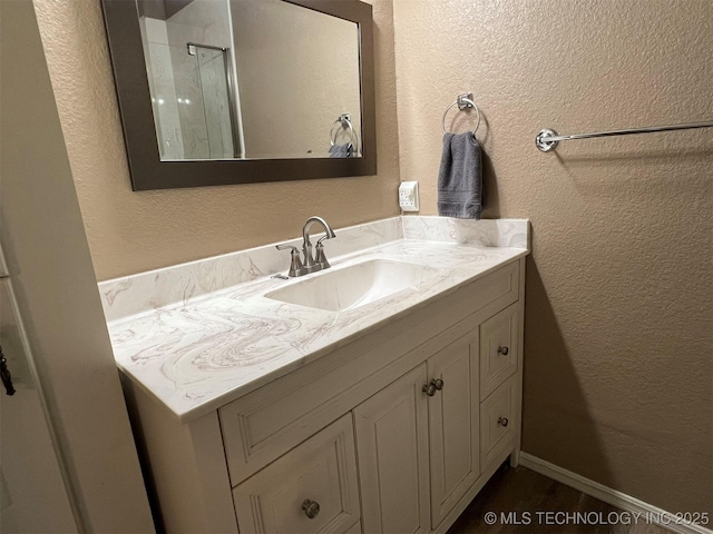 1380 N Lakeview Ave, Mannford, OK 74044 - bathroom with vanity and a textured wall