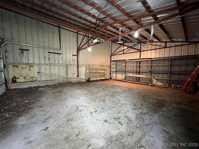 1380 N Lakeview Ave, Mannford, OK 74044 - garage with a garage door opener and metal wall