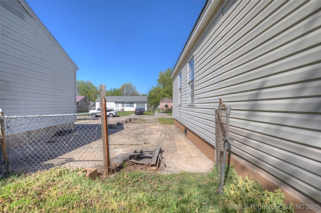 view of property exterior featuring crawl space and fence