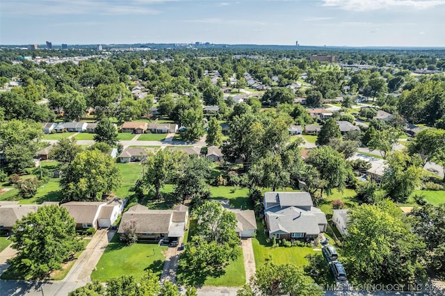 4222 E 25th St, Tulsa, OK 74114 - aerial view of residential area with a tree filled landscape