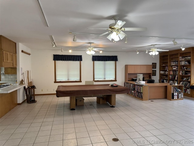recreation room featuring rail lighting, light tile patterned flooring, billiards, and ceiling fan