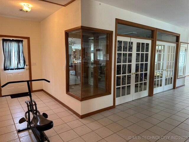 402325 W 2100th Rd, Bartlesville, OK 74006 - view of exterior entry with french doors and a patio area