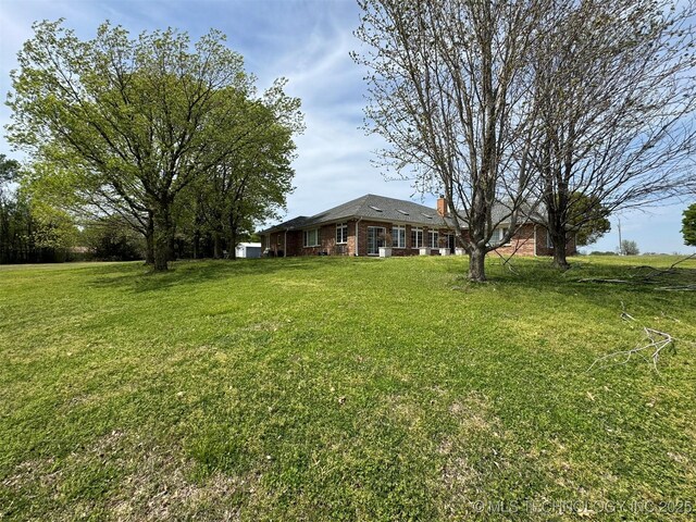 402325 W 2100th Rd, Bartlesville, OK 74006 - view of green lawn