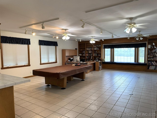 402325 W 2100th Rd, Bartlesville, OK 74006 - recreation room featuring rail lighting, light tile patterned flooring, billiards table, and ceiling fan