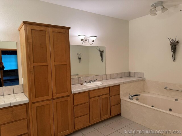 402325 W 2100th Rd, Bartlesville, OK 74006 - bathroom featuring tile patterned floors, vanity, and a whirlpool tub