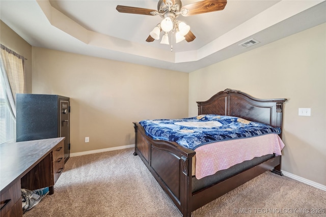 54555 E 340th Rd, Jay, OK 74346 - bedroom with a tray ceiling, baseboards, and light colored carpet