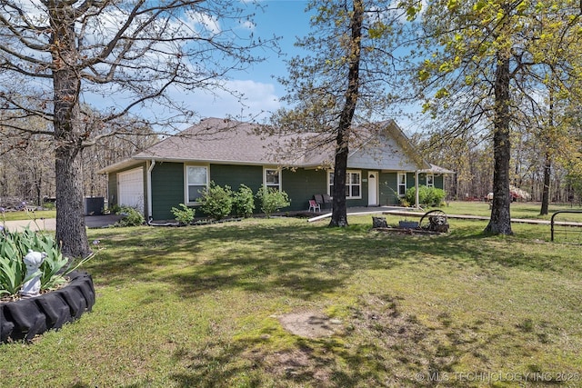 54555 E 340th Rd, Jay, OK 74346 - view of front of property with a garage, central AC, and a front lawn