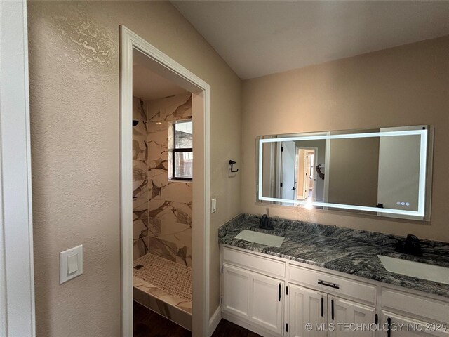 13802 E 19th Pl, Tulsa, OK 74108 - full bathroom featuring double vanity, a stall shower, and a sink